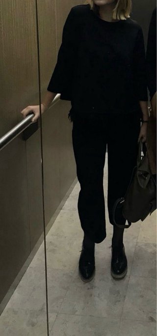 Conjunto negro con flecos