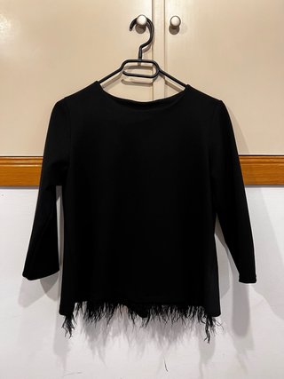 Conjunto negro con flecos