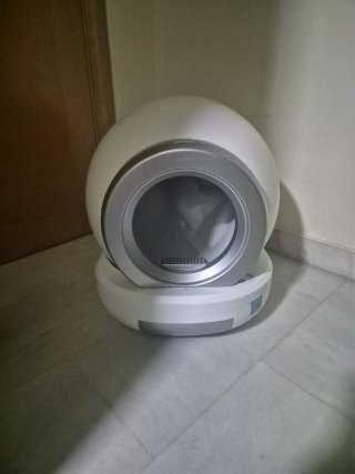 Arenero automático para gatos