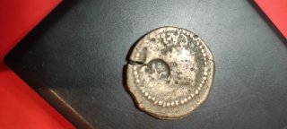 Imperio romano As de Trajano con resello