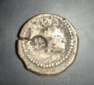 Imperio romano As de Trajano con resello