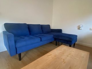 Sofá rinconera de terciopelo azul