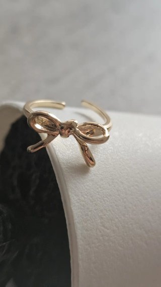Anello regolabile fiocco oro