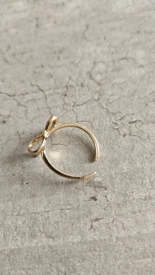 Anello regolabile fiocco oro