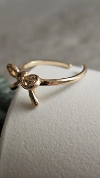 Anello regolabile fiocco oro