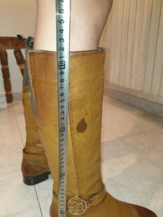 Stivali alti in pelle marrone