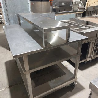 Mesa central profesional de acero inoxidable rueda