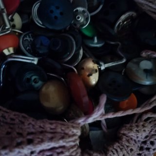 Bolsa de crochet con cordón y borlas