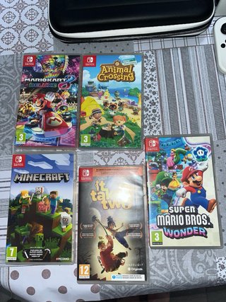 Nintendo Switch OLED Blanca y Negra  +5 juegos
