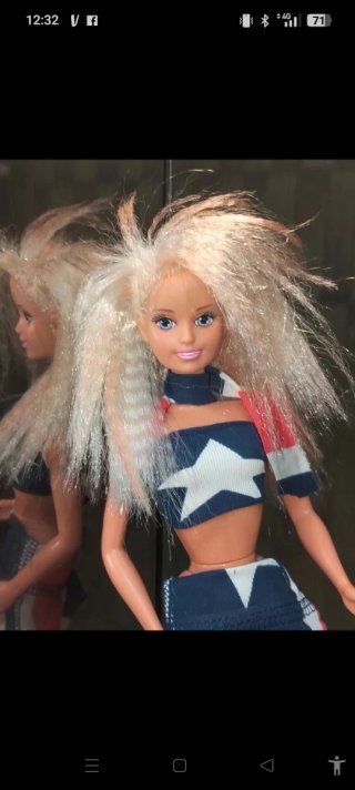 Bambola simil Barbie con vestito a stelle