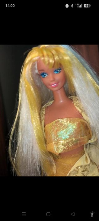 Barbie bionda con gonna glitter