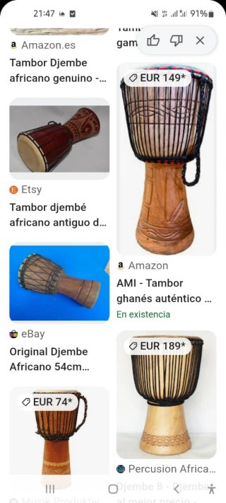 Tambor de madera grande con cara tallada