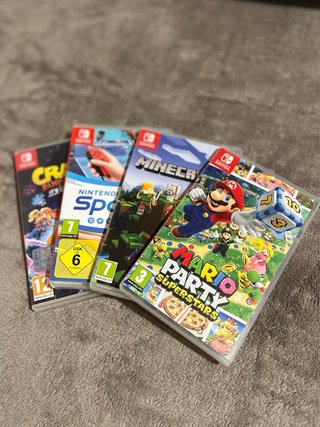 Nintendo Switch OLED Bianca + 4 Giochi
