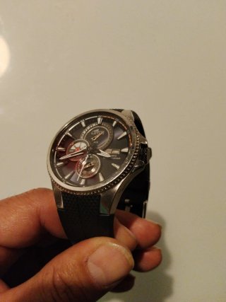 Reloj Lotus azul marino y plateado