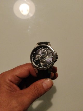 Reloj Lotus azul marino y plateado