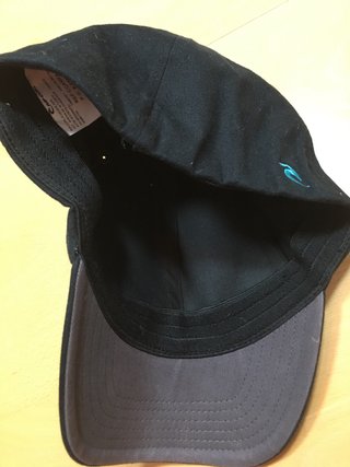 Gorra Rip Curl Negra con Detalles Teal