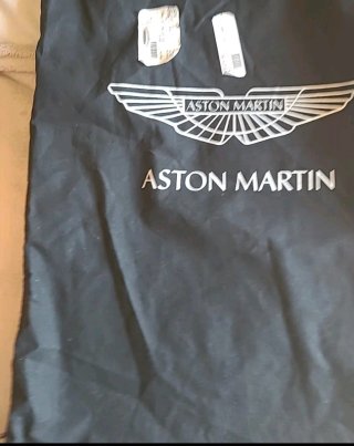 Bolso de viaje de piel marrón y naranja