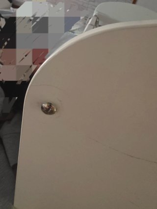 Cuna de bebé con protector de elefantes