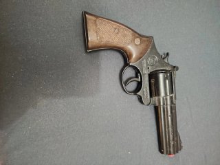 Pistola de juguete de metal