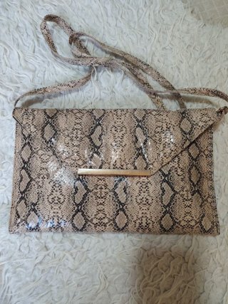 Bolso sobre estampado animal