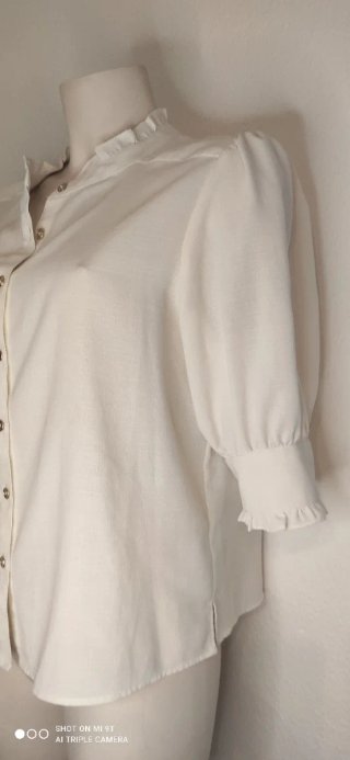 Blusa Tommy Hilfiger blanca hueso Elegante .