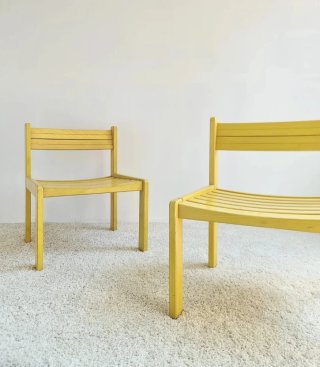 Butaca baja madera amarilla Francia 70s