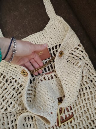 Borsa a mano Yves Saint Laurent beige e dorata