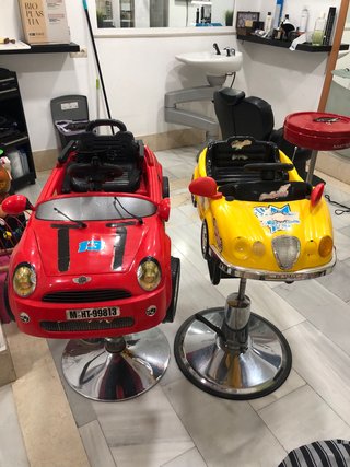 Poltrona da barbiere per bambini con design auto idraulico