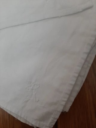 12 servilletas blancas con flor bordada