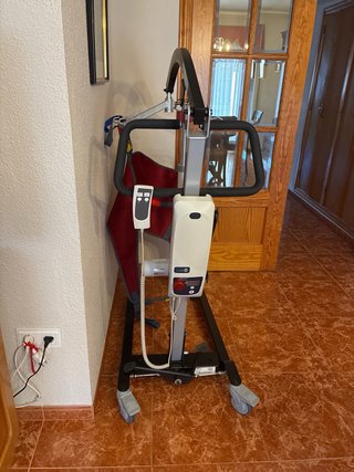 Grúa eléctrica ortopédica con arnes,