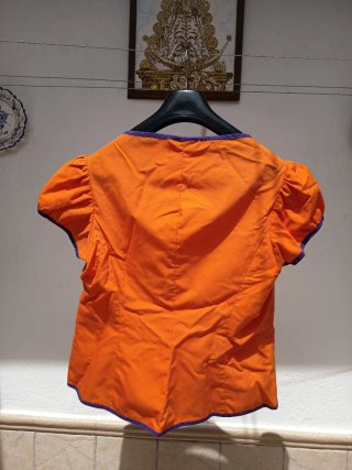 Traje de flamenca naranja y morado