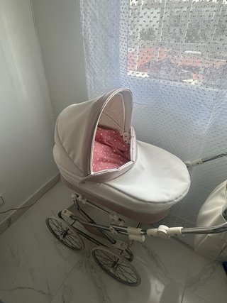 Carrito de muñecas con bolso