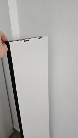 Espejo de pared negro y madera