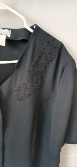 Blusón señora negro con botones dorados