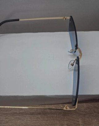Occhiali da sole senza montatura oro e azzurro