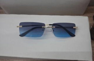 Occhiali da sole senza montatura oro e azzurro