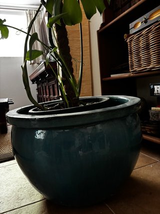 Macetero de cerámica azul verdoso