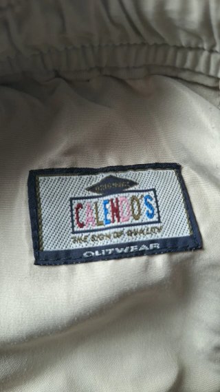 Pantalón corto niño beige con logo lagarto