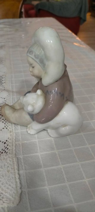 Figura Lladro vintage niño con oso polar