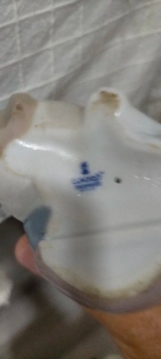 Figura Lladro vintage niño con oso polar