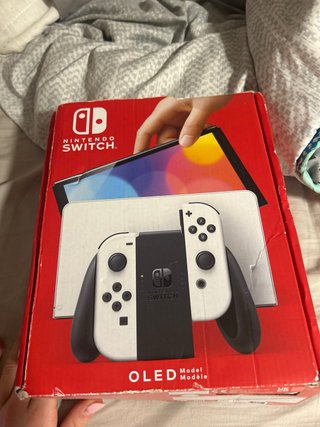 Nintendo Switch OLED Blanca y 3 juegos