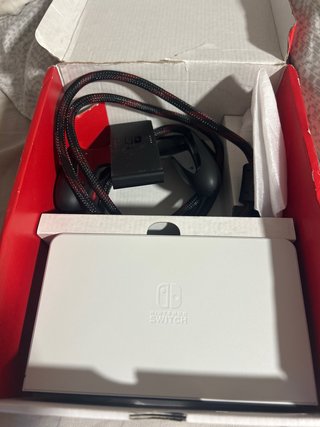 Nintendo Switch OLED Blanca y 3 juegos