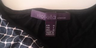 Blusa negra con cuadraditos blancos