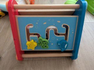 Triangolo attività Hape in legno