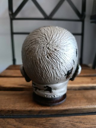 Cabeza de muñeco antigua de níquel