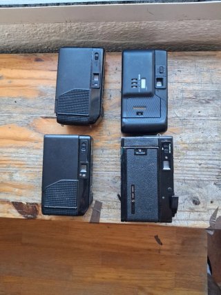Consegna di fotocamere Canon e Nikon per ricambi