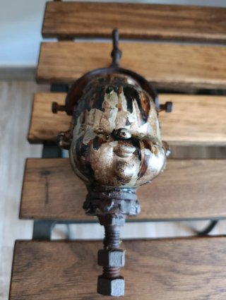 Molde antiguo de cabeza de muñeco de níquel