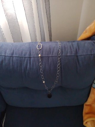 Collar de plata con colgante negro