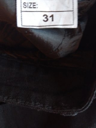 Jeans AMIRI neri strappati taglia 31
