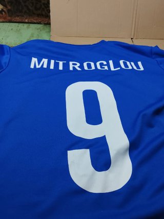 Maglietta sportiva blu numero 9